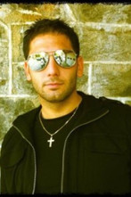 Vincenzo Caiola as Police Officer