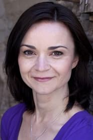 Julia Arkos as Ann Wilkerson