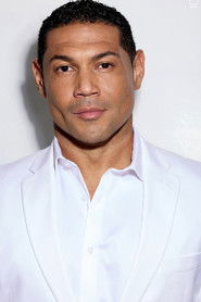 Dan White as Romadal