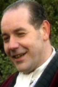 Roger Blake as Noel Coward