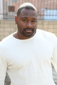 Mustafa Harris as Prison Guard