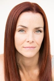 Annie Wersching as Woman at Party