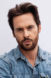 Portrait de Tom Riley dans le rôle de Adrian