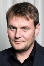 Devid Striesow as Händler