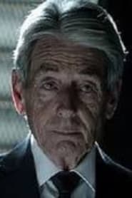 John Nolan as Young Guest