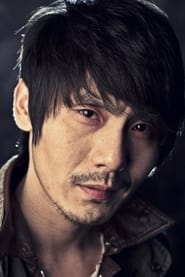 Kim Bum-suk as Coach / NK track team