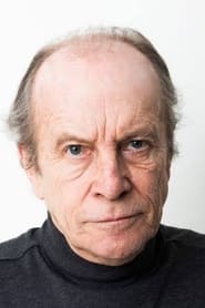 Juan Carlos Colombo is Giles Healey