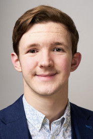 Nathan Hall as London Passerby