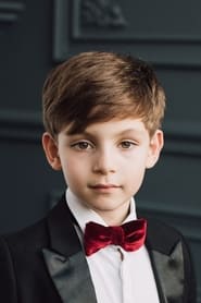 Martin Zolotarev as Little Boy in Suit