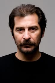 Uğur Polat as Aziz