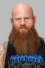 Joseph Ruud as Erick Rowan (Ringside)