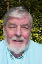 Michael Kilgarriff as Voice of God