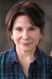 Carolyn Mignini is Gloria Toms