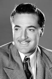 Edward Ashley as Announcer at Chicken Race