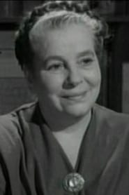 Nora Gordon as Mrs. Lewis