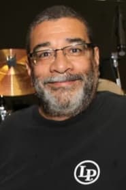 Lenny Castro as Super Group Percussionist