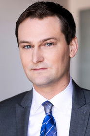 Randy Vinneau as Conference Goer (uncredited)