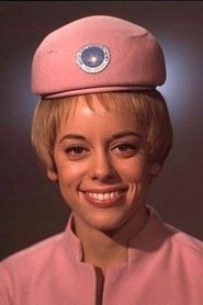 Chela Matthison as Stewardess