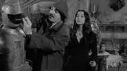 Morticia and Gomez vs. Fester and Grandmama
