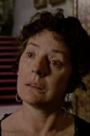 Catherine Willmer as Dr. Grogan's Housekeeper