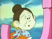 Riding under an umbrella on candy days