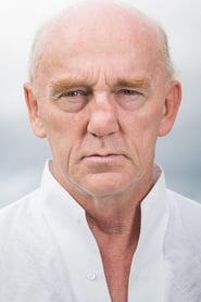 Romuald Klos as Priest at Shop Window