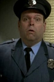 Paul A. MacFarlane as Security Guard