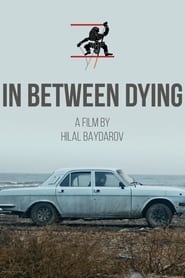 In Between Dying постер