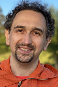 Timur Artemyev as Photo (archiveFootage)