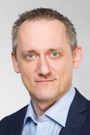 Michal Kubal as Czech TV News Anchor (uncredited)
