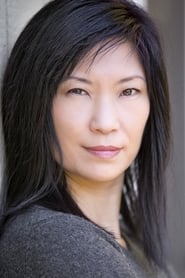 Jodi Fung as T.V. Reporter