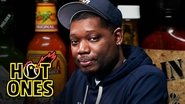 Michael Che Gs Up While Eating Spicy Wings