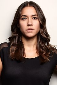 Elena Martínez is Ticket Agent