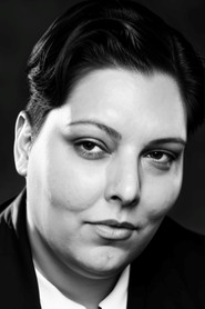 Laura Eden Kilmer as Student / Background