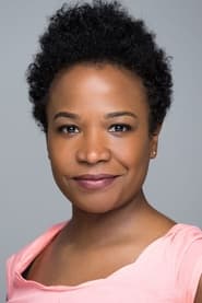 Eboni Booth as TV Reporter
