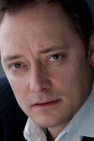 Lance Baker as Reporter