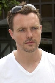 Ciarán McMenamin is Capt. Ernest Gordon