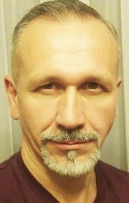 Михаил Каминский