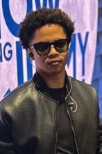 Caleb Spikes as Guitarist