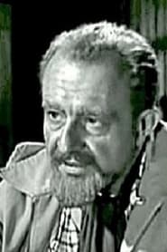 George Becwar as Miles Lauber, the big boss