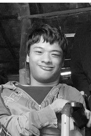 Toe Shin is The Man In The Wheelchair