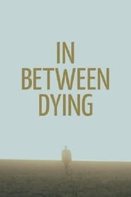 In Between Dying постер