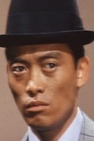 Kazuo Suzuki is Bank Robber Okuda