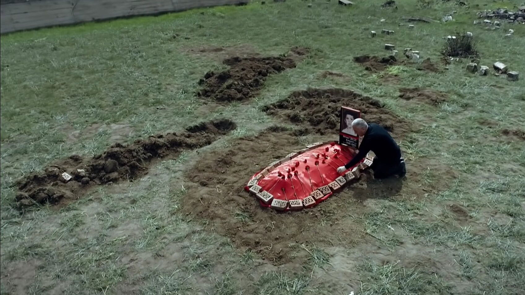 The grave under the plum tree