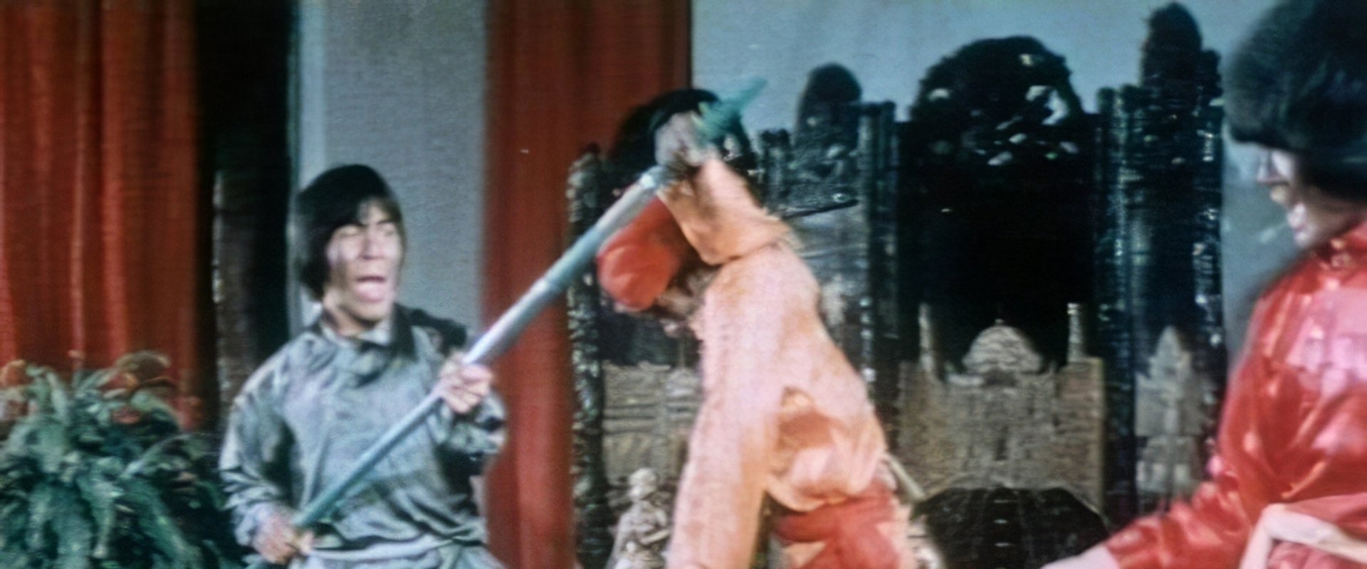 Kung Fu vs. Yoga backdrop