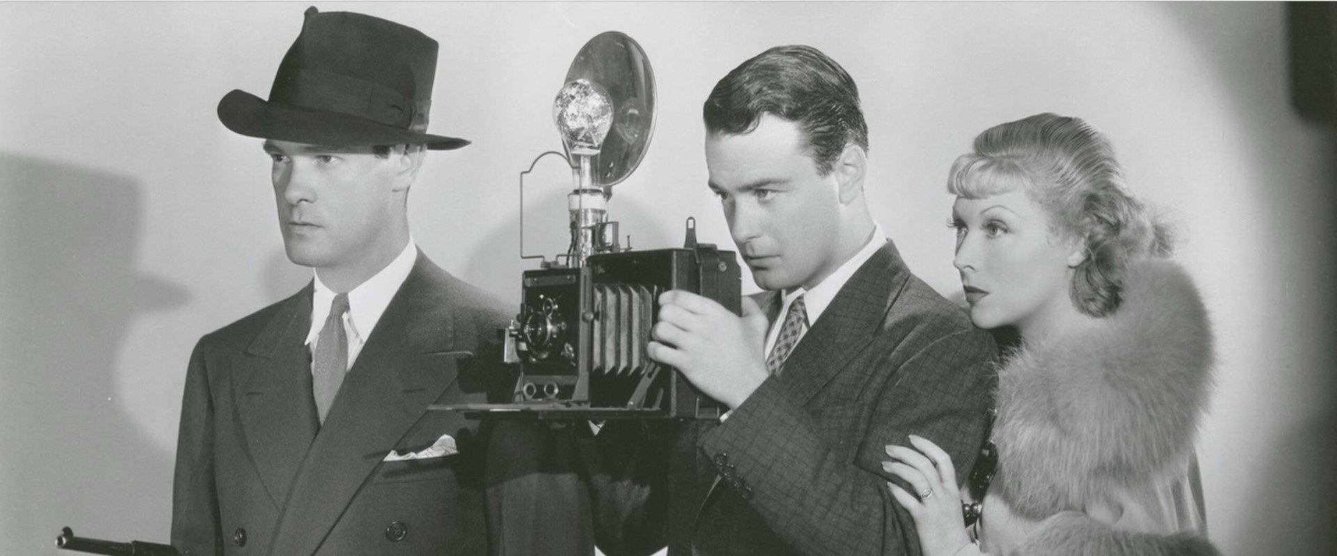 Murder with Pictures backdrop