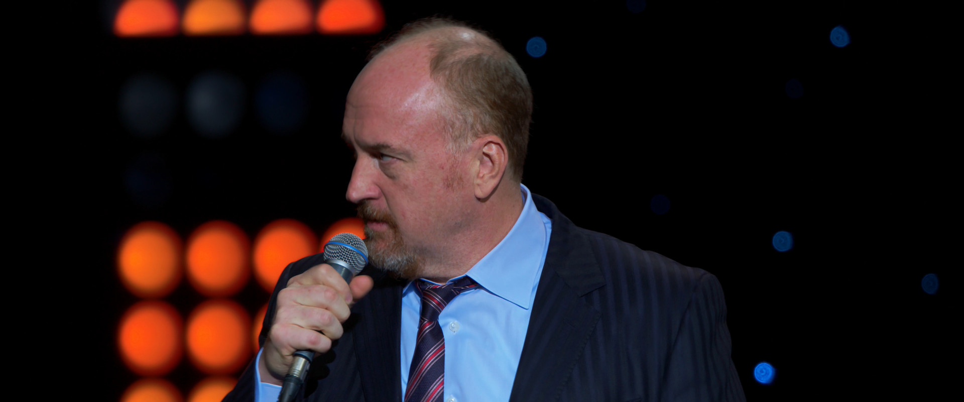 Louis C.K. 2017 backdrop