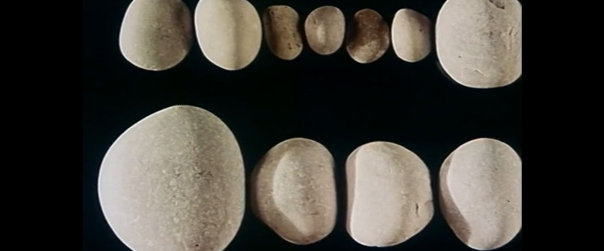 A Game with Stones backdrop