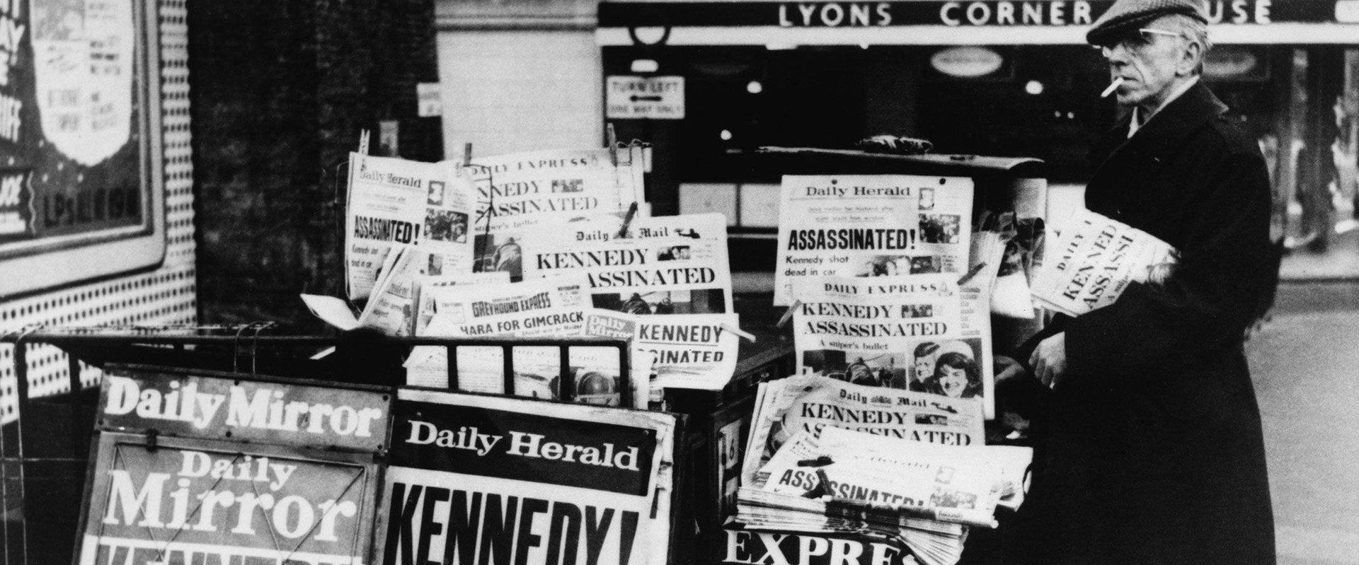 JFK: Breaking the News backdrop