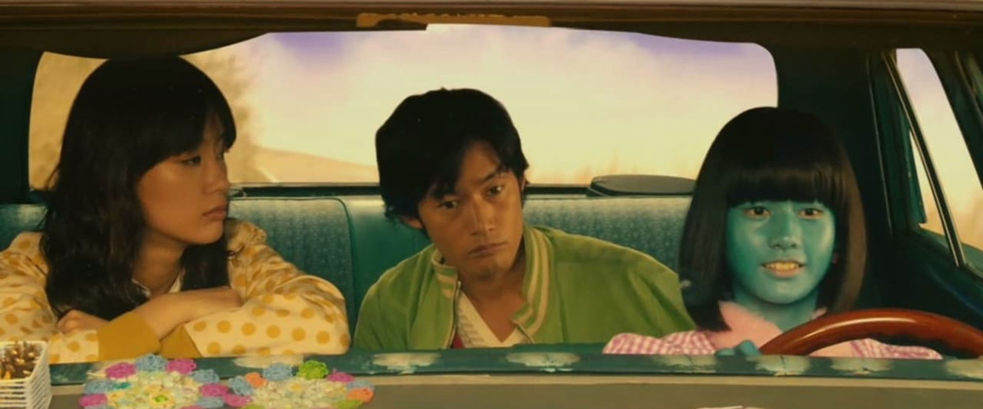 A Honeymoon in Hell: Mr. & Mrs. Oki's Fabulous Trip backdrop